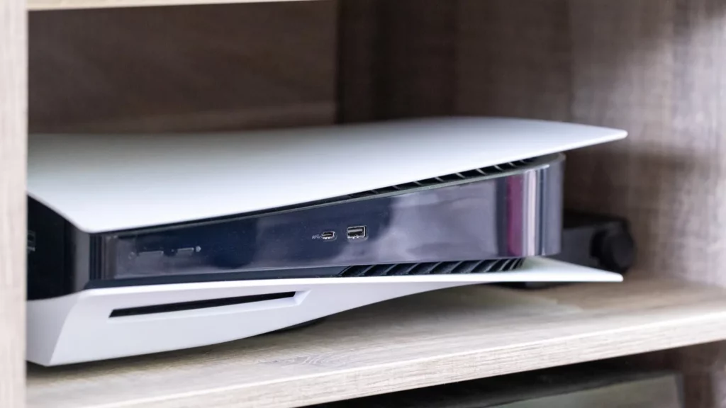 USB ports on PS5 placed on a wooden shelf