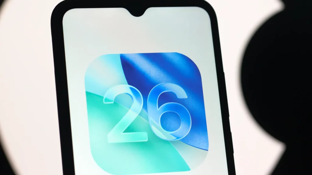 A logo of IOS 26 displayed on smartphone