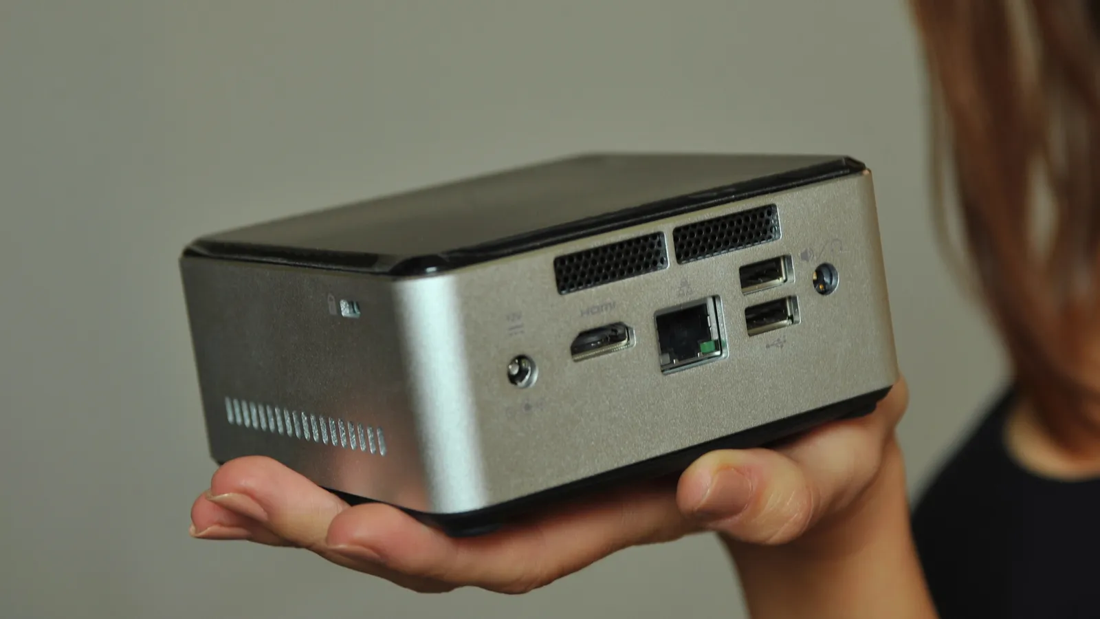 AI-powered mini PC with front buttons streamlines productivity and desk setup