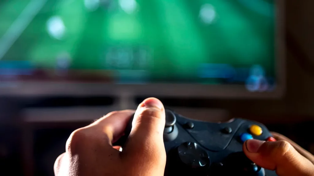 A closeup image of young man playing soccer game.