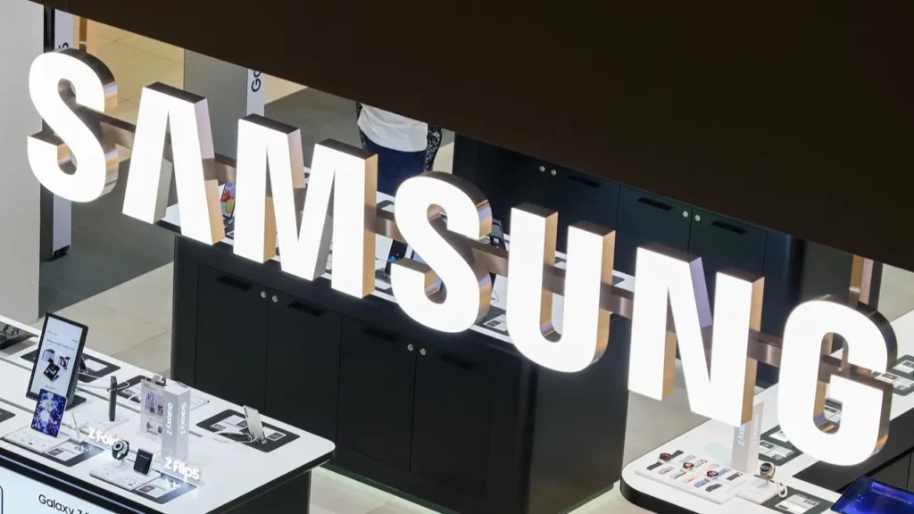 Illuminated Samsung logo in a retail store.