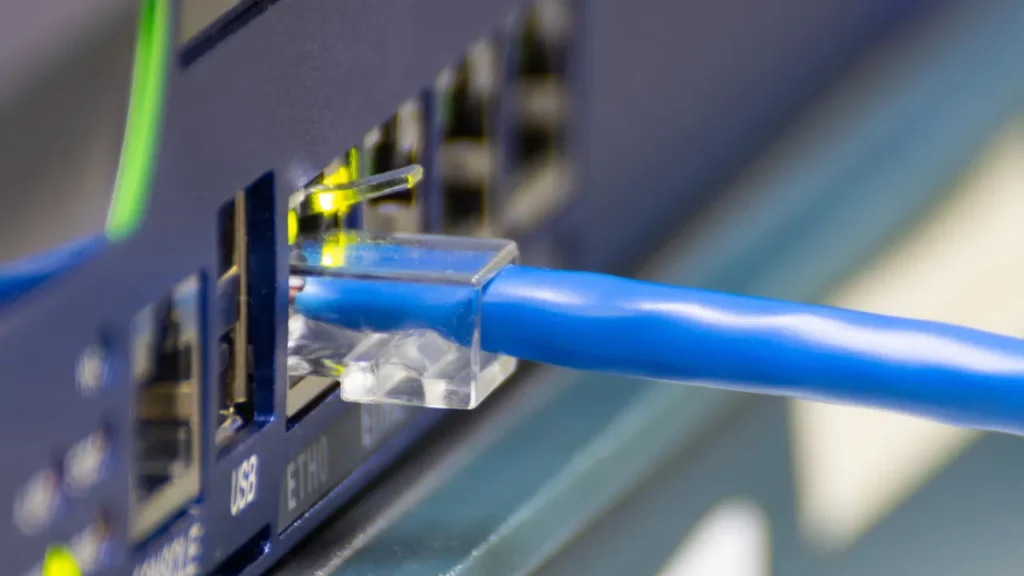 Ethernet cable plugged into a router.