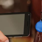 Phone scanning an NFC tag.