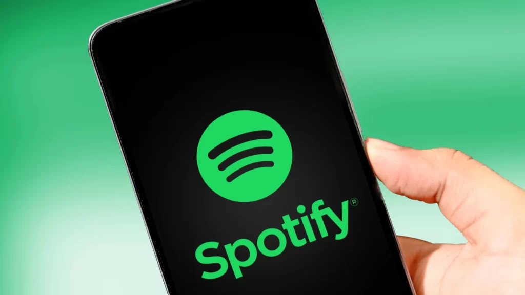 Spotify muzikos programa mobiliojo telefono ekrane.